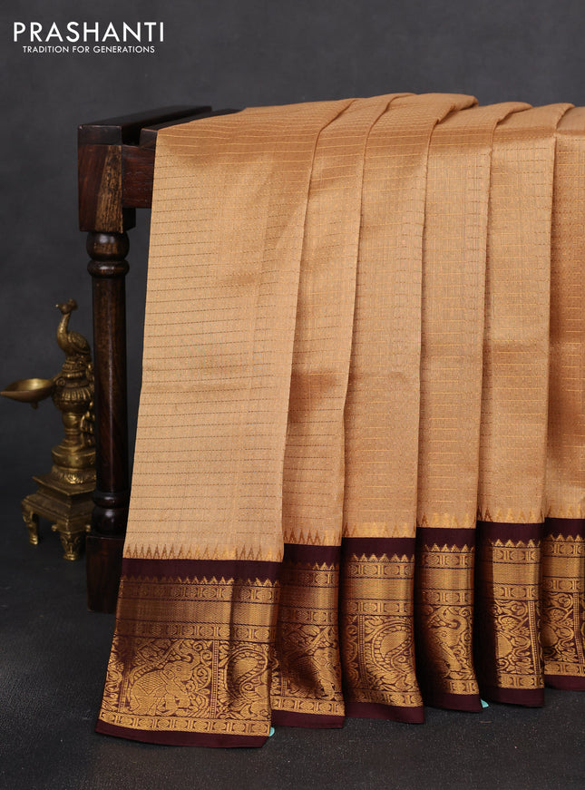 Kuppadam silk cotton saree sandal and deep maroon with allover zari checks & lakshadeepam weaves and zari woven border