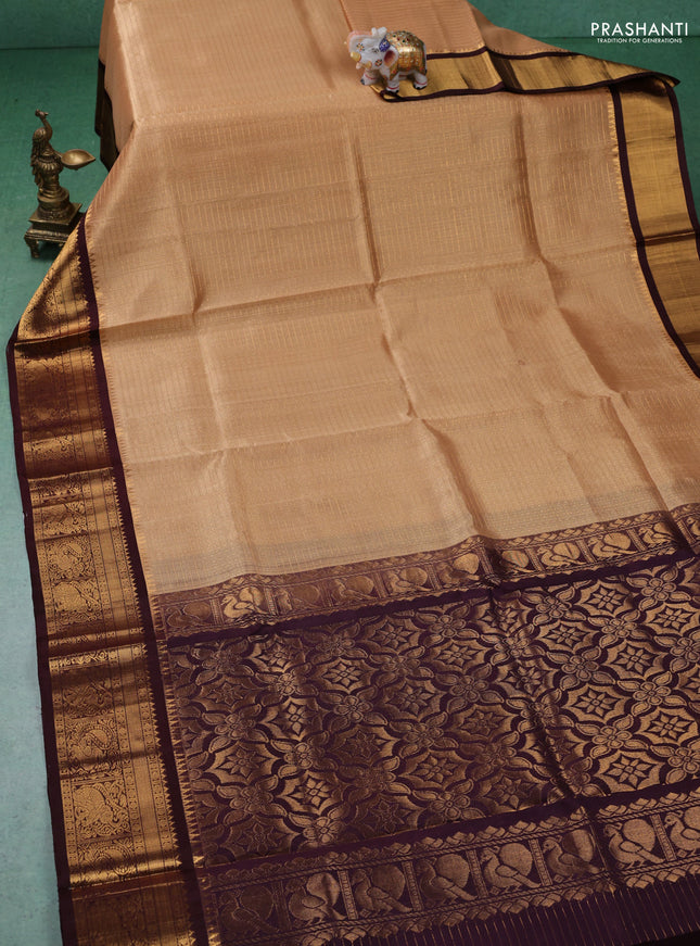 Kuppadam silk cotton saree sandal and deep maroon with allover zari checks & lakshadeepam weaves and zari woven border
