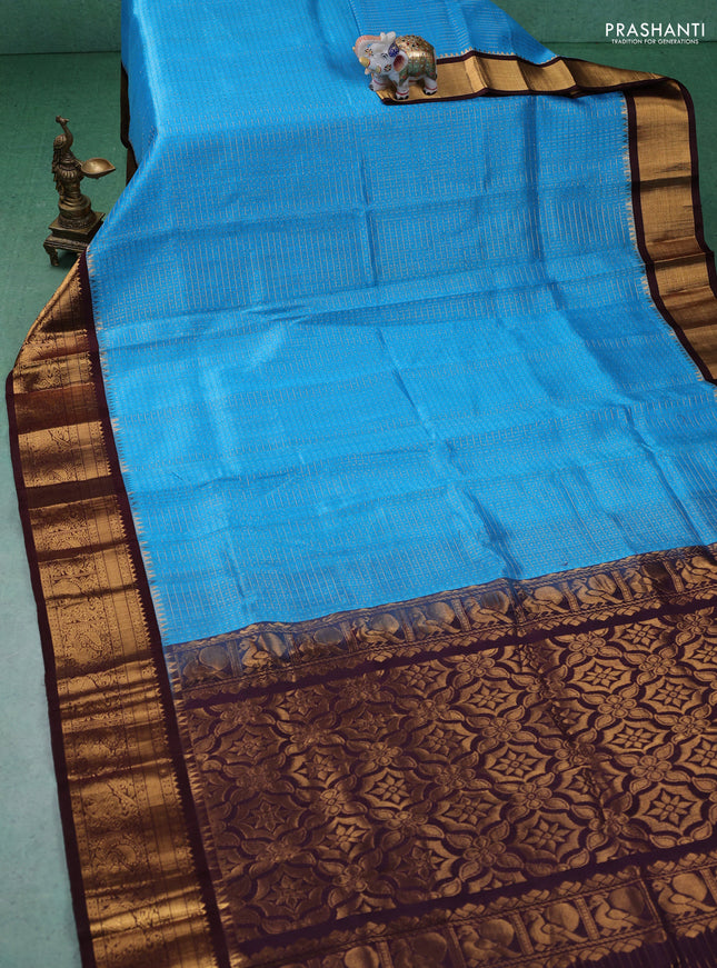Kuppadam silk cotton saree cs blue and deep maroon with allover zari checks & lakshadeepam weaves and zari woven border
