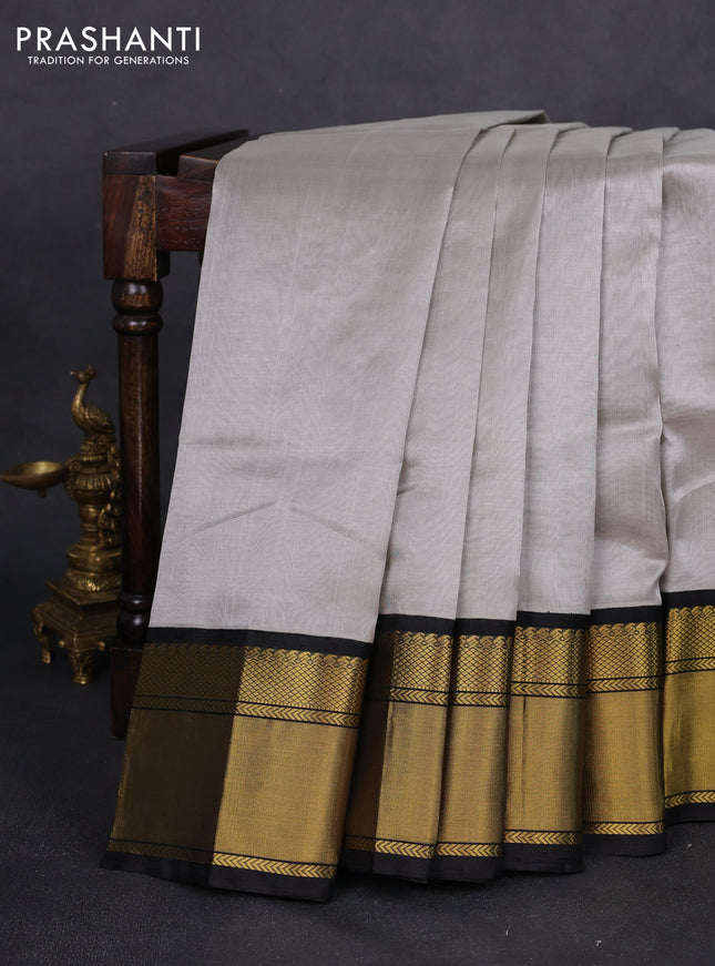 Kuppadam silk cotton saree grey and black with plain body and zari woven border