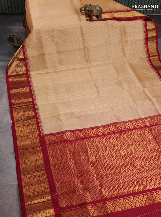 Kuppadam silk cotton saree sandal and maroon with allover zari checks & lakshadeepam weaves and zari woven border