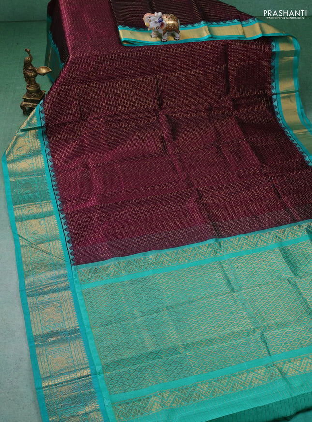 Kuppadam silk cotton saree wine shade and teal green with allover zari checks & lakshadeepam weaves and zari woven border