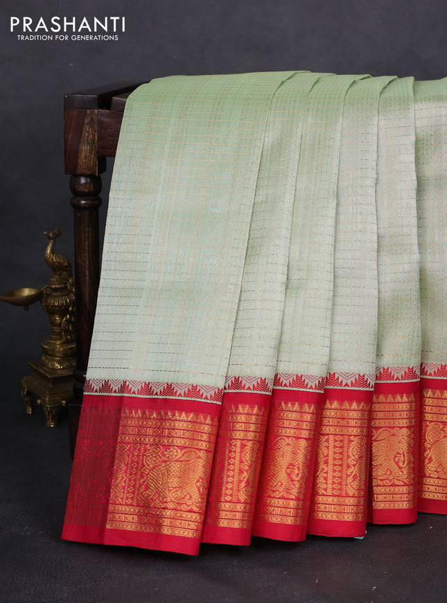 Kuppadam silk cotton saree pista green and pink with allover zari checks & lakshadeepam weaves and zari woven border