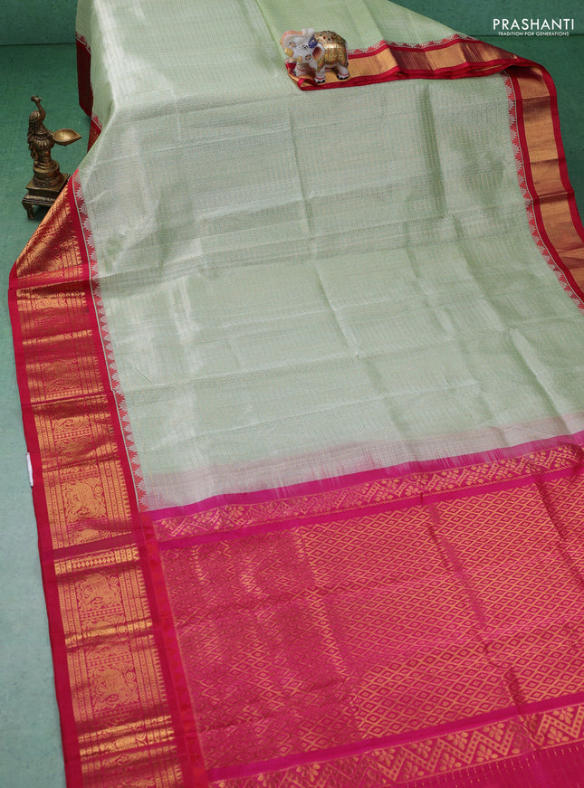 Kuppadam silk cotton saree pista green and pink with allover zari checks & lakshadeepam weaves and zari woven border