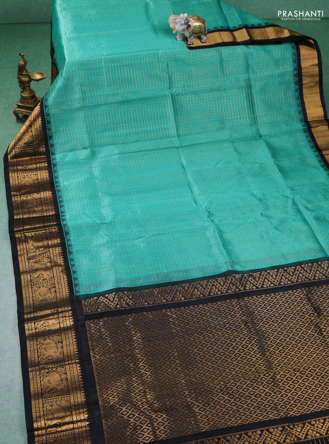 Kuppadam silk cotton saree teal green and black with allover zari checks & lakshadeepam weaves and zari woven border