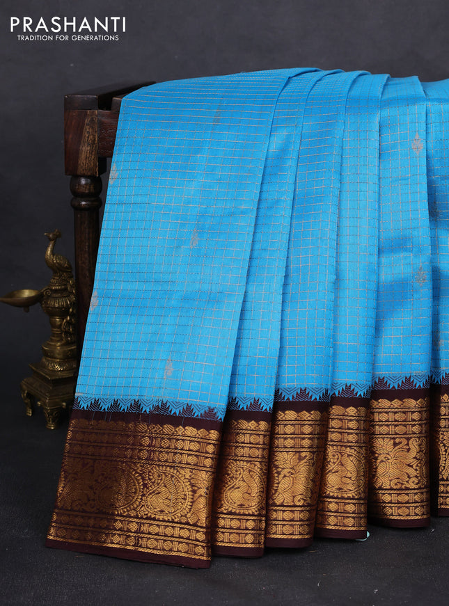 Kuppadam silk cotton saree cs blue and wine shade with allover zari checked pattern and zari woven border