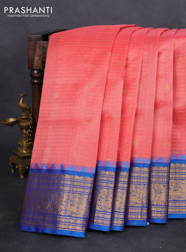 Kuppadam silk cotton saree peach pink and cs blue with allover zari checked pattern and zari woven border