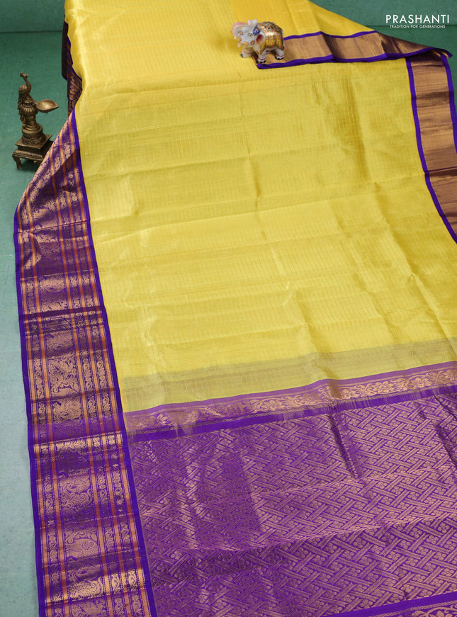 Kuppadam silk cotton saree yellow and violet with allover zari checked pattern and long zari woven border