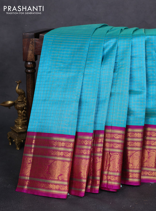 Kuppadam silk cotton saree cs blue and purple with allover zari checked pattern and long zari woven border