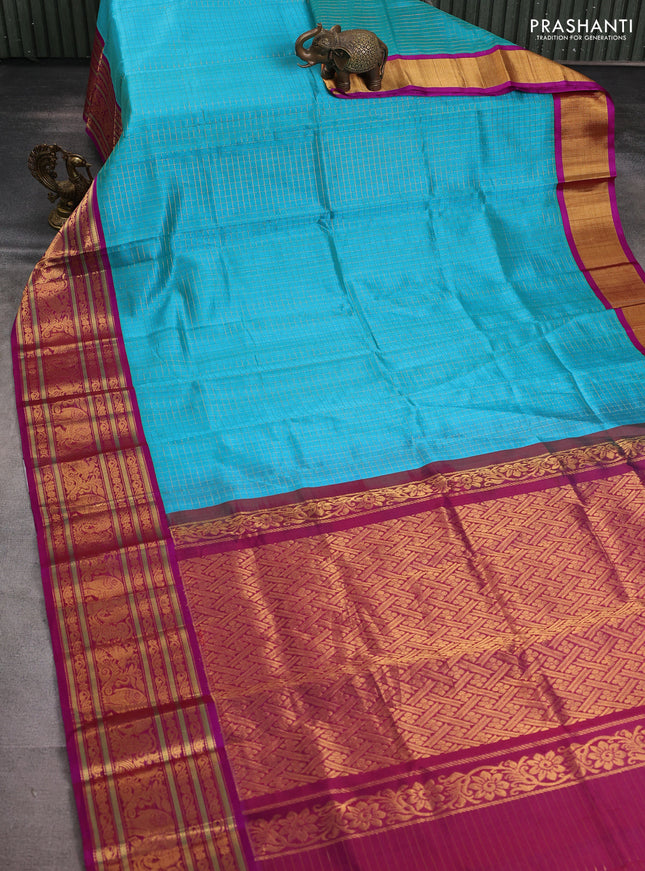 Kuppadam silk cotton saree cs blue and purple with allover zari checked pattern and long zari woven border