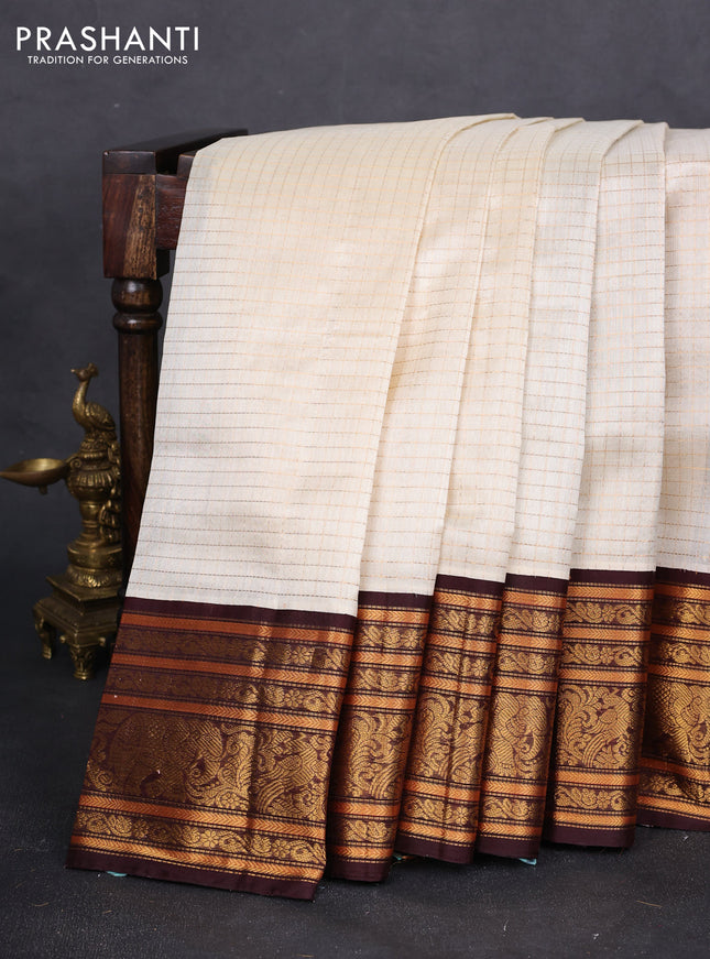 Kuppadam silk cotton saree off white and coffee brown with allover zari checked pattern and long zari woven border