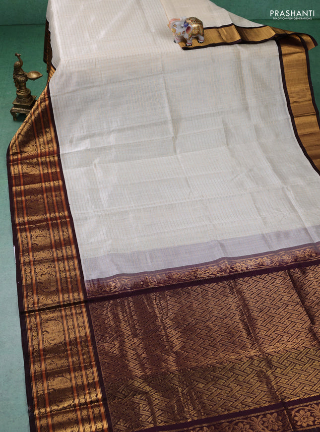 Kuppadam silk cotton saree off white and coffee brown with allover zari checked pattern and long zari woven border