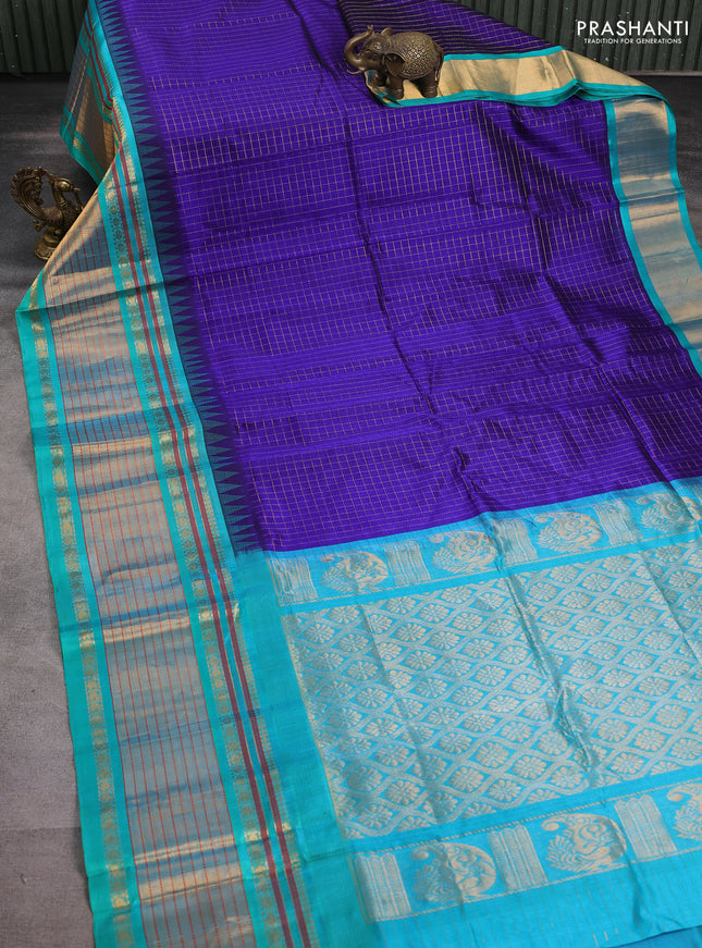 Kuppadam silk cotton saree blue and teal green with allover zari checked pattern and temple design zari woven border