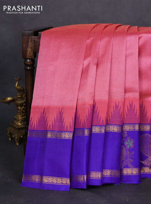 Kuppadam silk cotton saree peach pink and blue with allover small checked pattern and temple design zari annam butta border