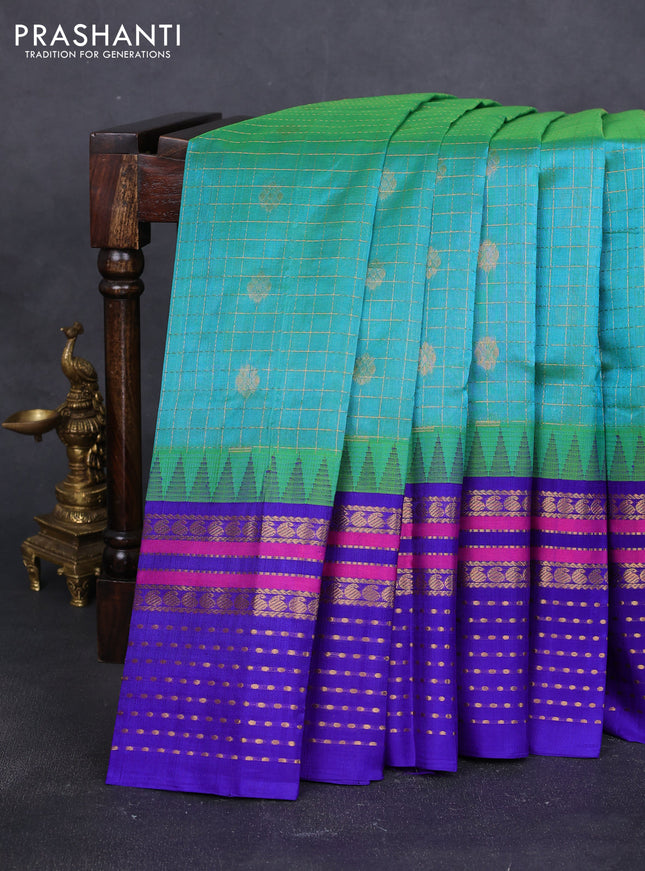 Kuppadam silk cotton saree dual shade of green and blue with zari checks & buttas and temple design zari woven border