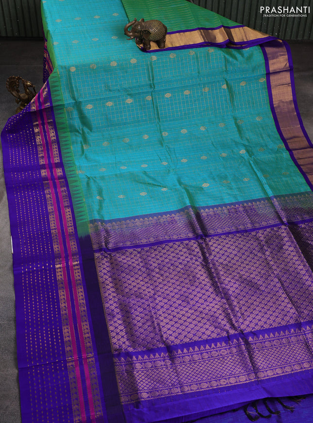 Kuppadam silk cotton saree dual shade of green and blue with zari checks & buttas and temple design zari woven border
