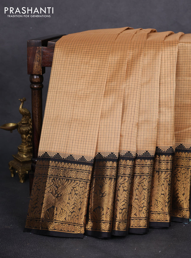 Kuppadam silk cotton saree sandal and black with allover small checked pattern and long zari woven border