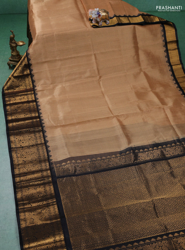 Kuppadam silk cotton saree sandal and black with allover small checked pattern and long zari woven border