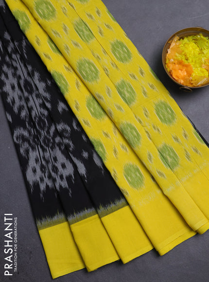 Ikat cotton saree black and yellow with allover ikat weaves and simple border
