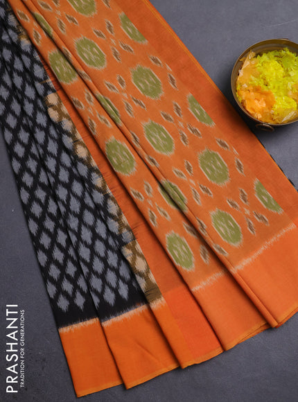Ikat cotton saree black and orange with allover ikat weaves and simple border