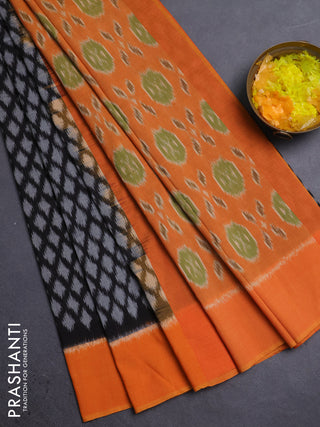 Ikat cotton saree black and orange with allover ikat weaves and simple border
