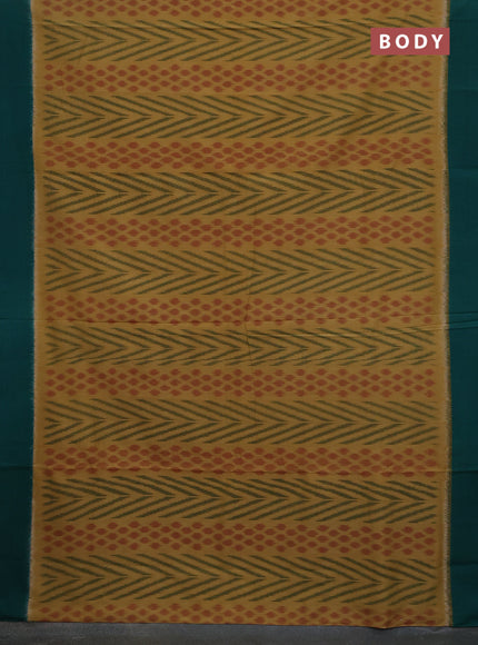 Ikat cotton saree mustard shade and green with allover ikat weaves and simple border