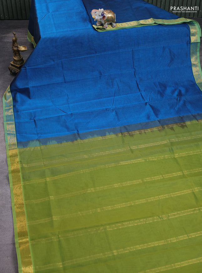 Silk cotton saree peacock blue and light green with plain body and paisley zari woven border