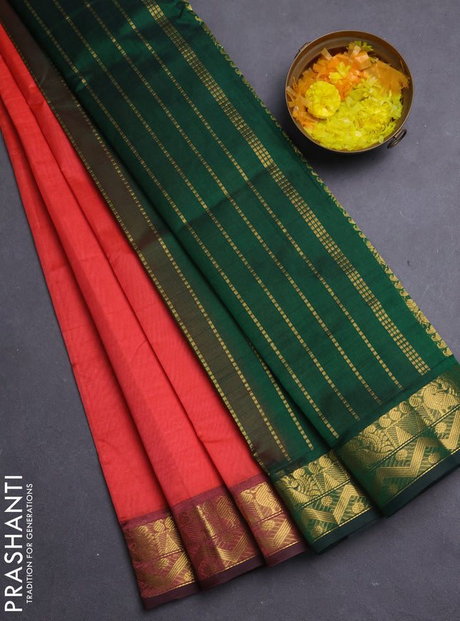 Silk cotton saree orange and green with plain body and annam zari woven border