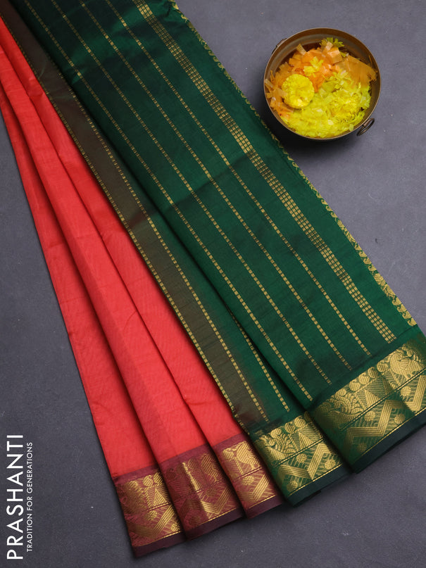 Silk cotton saree orange and green with plain body and annam zari woven border