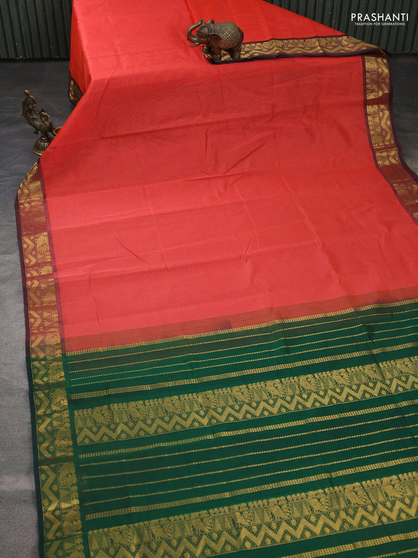 Silk cotton saree orange and green with plain body and annam zari woven border