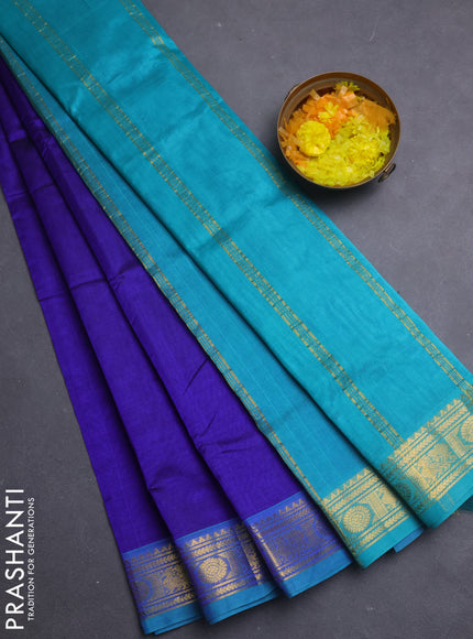 Silk cotton saree blue and teal blue with plain body and annam & rudraksha zari woven border