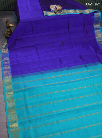 Silk cotton saree blue and teal blue with plain body and annam & rudraksha zari woven border