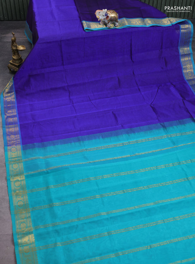 Silk cotton saree blue and teal blue with plain body and annam & rudraksha zari woven border