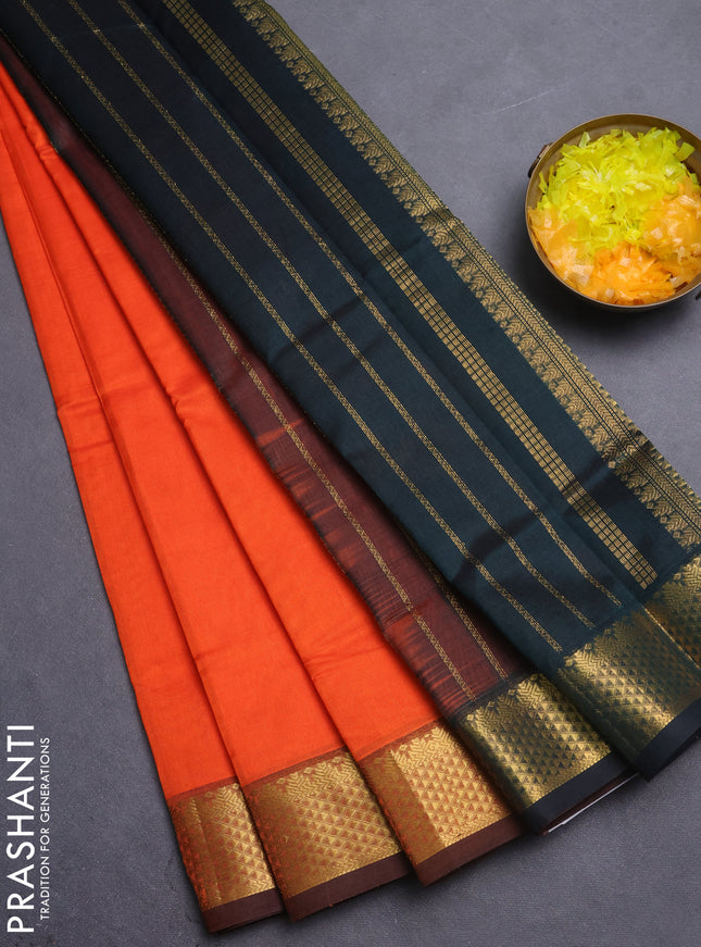 Silk cotton saree orange and bottle green with plain body and temple zari woven border