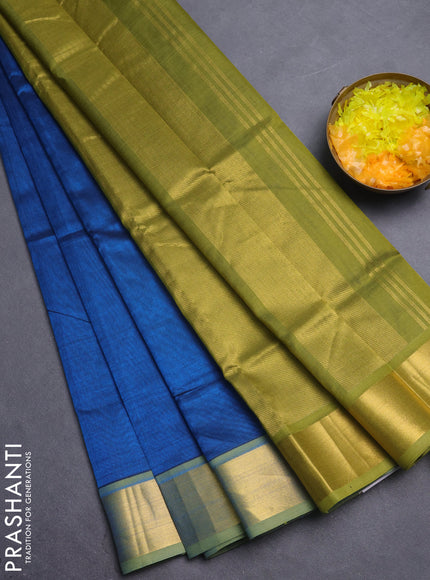 Silk cotton saree peacock blue and mehendi green with plain body and zari woven border