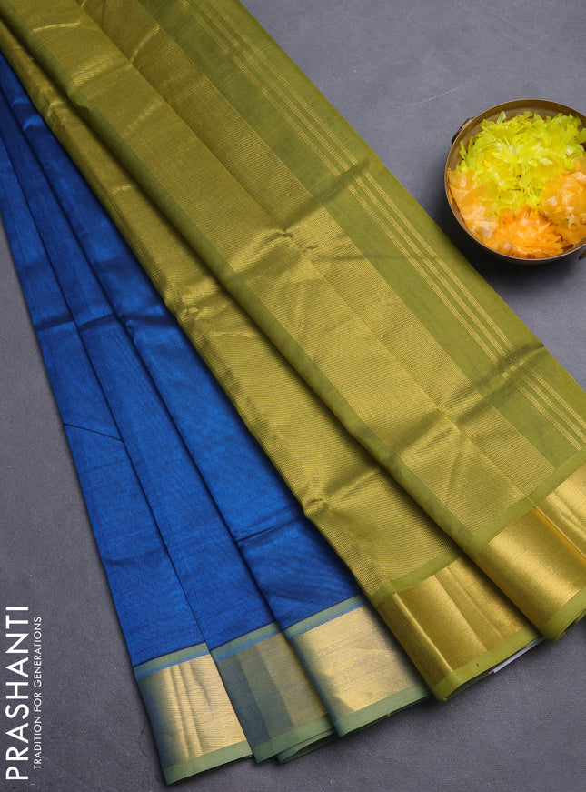 Silk cotton saree peacock blue and mehendi green with plain body and zari woven border