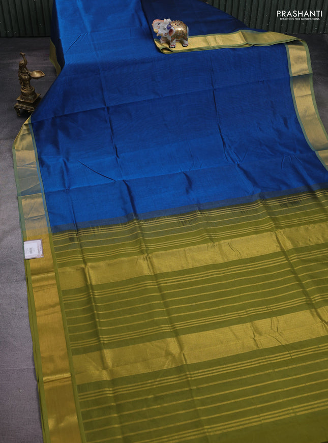 Silk cotton saree peacock blue and mehendi green with plain body and zari woven border
