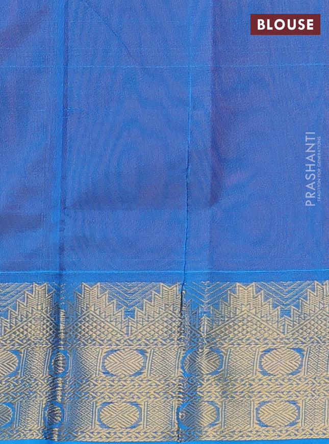 Silk cotton saree orange and teal blue with plain body and temple zari woven border