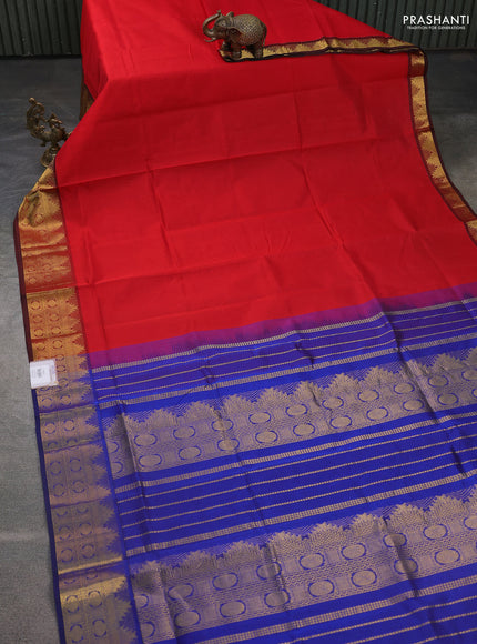 Silk cotton saree red and blue with plain body and temple zari woven border