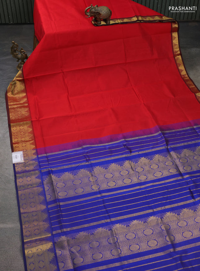 Silk cotton saree red and blue with plain body and temple zari woven border