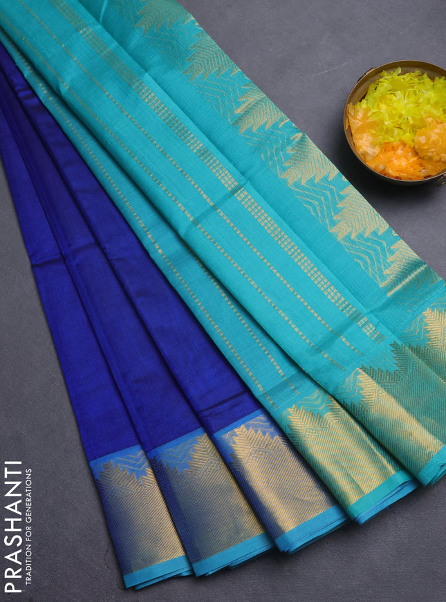 Silk cotton saree blue and teal blue with plain body and temple zari woven border