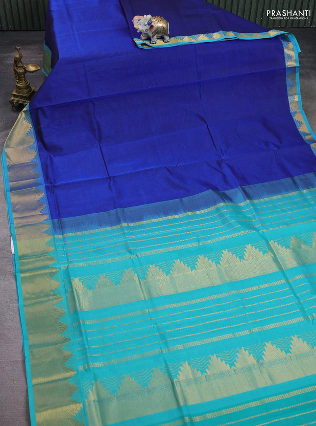 Silk cotton saree blue and teal blue with plain body and temple zari woven border