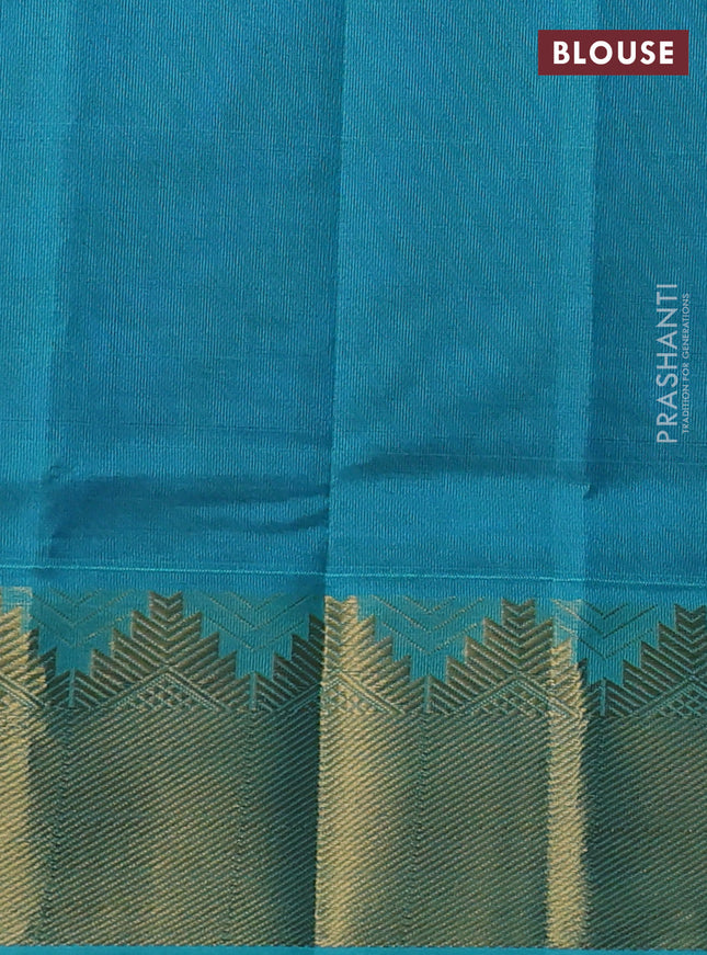 Silk cotton saree blue and teal blue with plain body and temple zari woven border