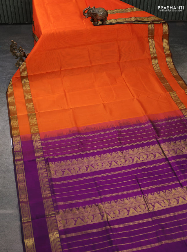 Silk cotton saree orange and purple with plain body and retttapet zari woven border