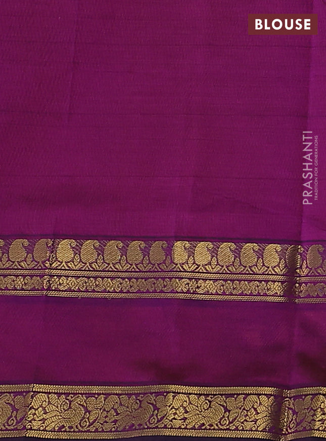 Silk cotton saree orange and purple with plain body and retttapet zari woven border