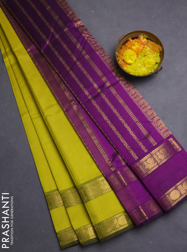Silk cotton saree lime yellow and purple with plain body and rettapet zari woven border