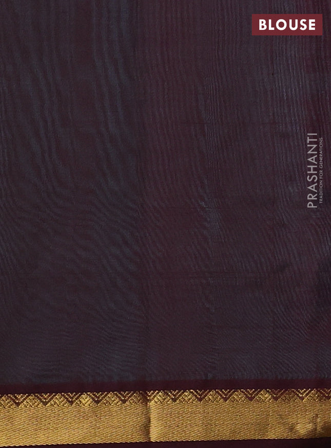 Silk cotton saree teal blue and deep maroon with plain body and zari woven border