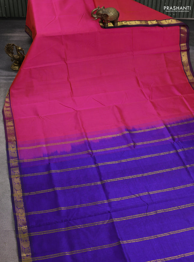 Silk cotton saree dual shade of pinkish orange and violet with plain body and zari woven border