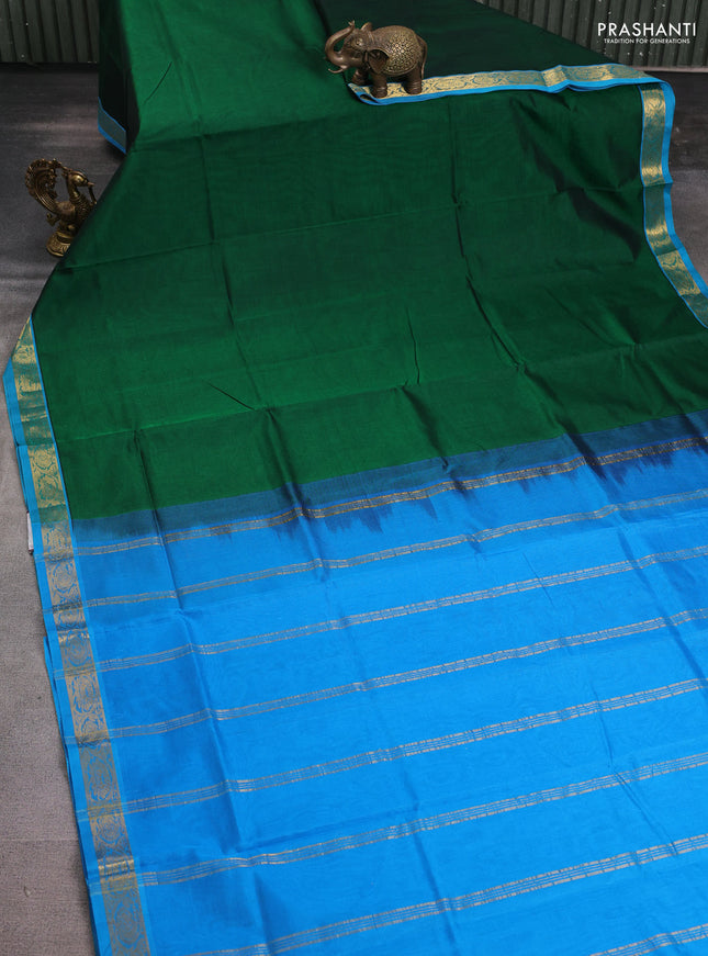 Silk cotton saree green and blue with plain body and zari woven border