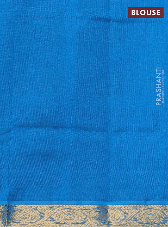 Silk cotton saree green and blue with plain body and zari woven border